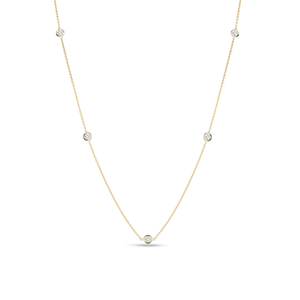 18k gold diamonds by the inch 5 station necklace from Roberto Coin....