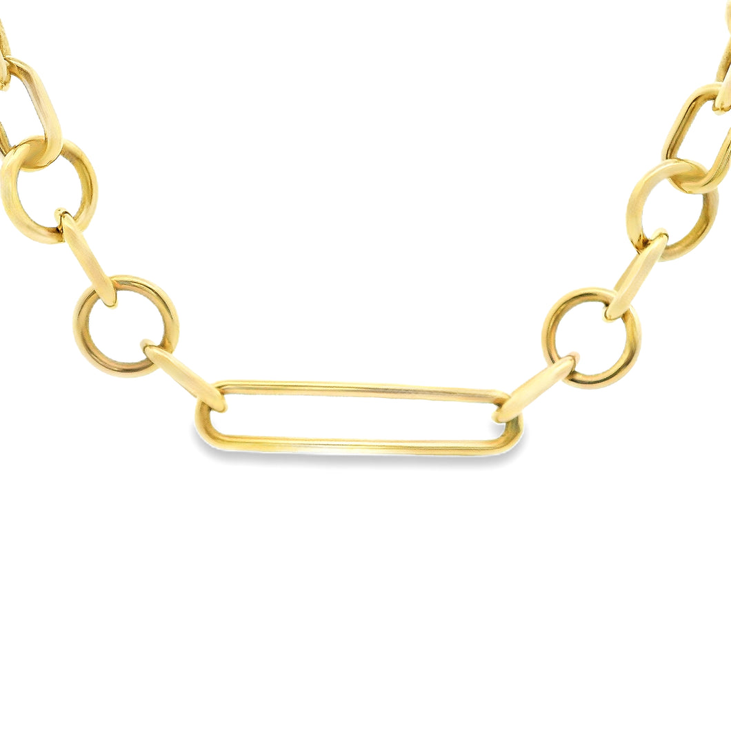 This 14k yellow gold necklace features various types of links. 
Nec...