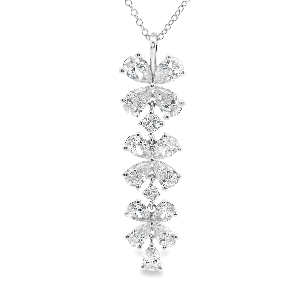 This gorgeous 18k white gold drop necklace features pear shape and ...