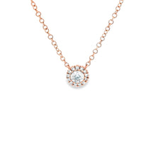 This mini 18k rose gold pendant features round brilliant cut diamon...