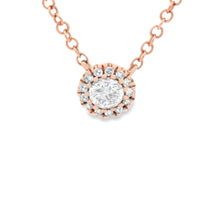 This mini 18k rose gold pendant features round brilliant cut diamon...