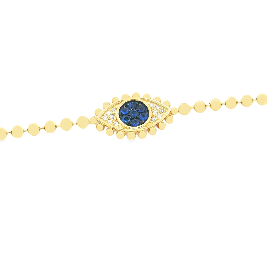 This 14k yellow gold evil eye bracelet features sapphires totaling ...