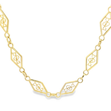 18k Yellow gold filigree chain.
Necklace measures 22