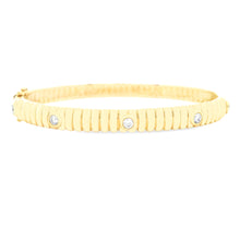 This easy to stack and style bangle features round brilliant cut di...