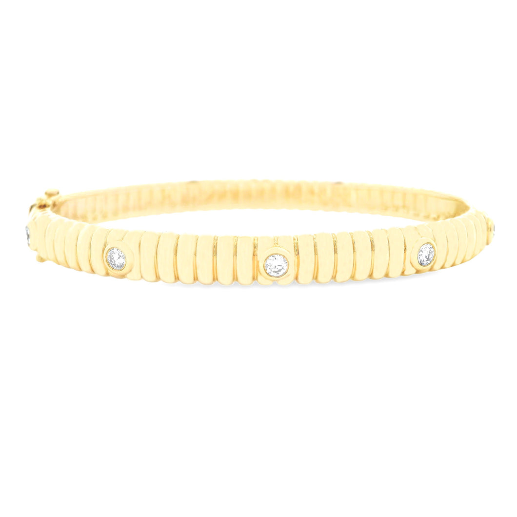 This easy to stack and style bangle features round brilliant cut di...