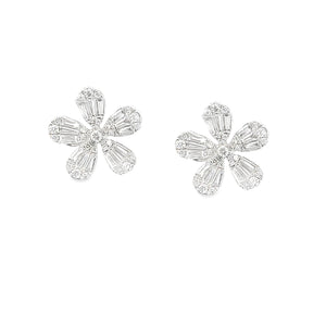 These 18k white gold diamond studs feature baguette and round brill...