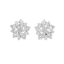 These beautiful 18k white gold stud earrings feature round brillian...