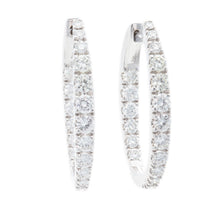 These beautiful diamond hoop earrings feature 36 round brilliant cu...