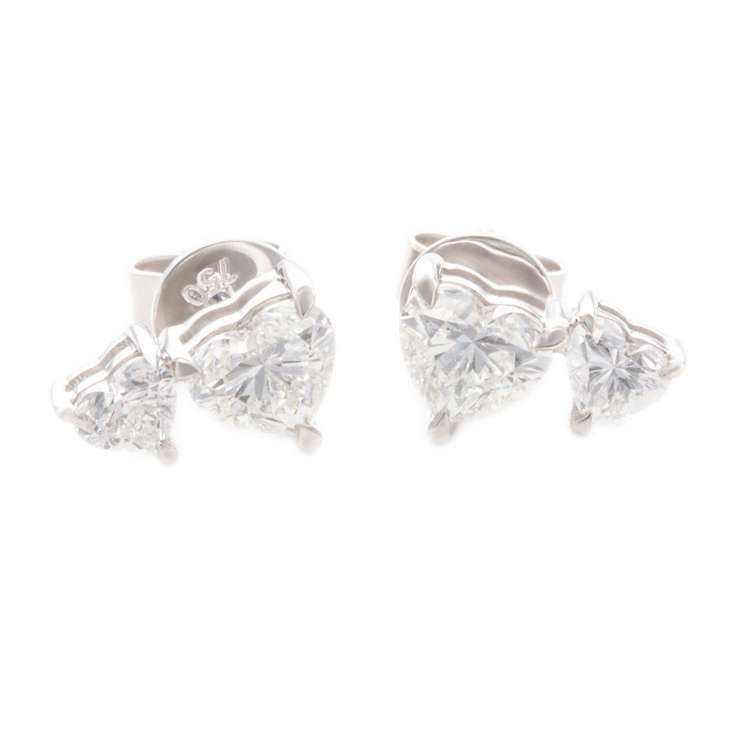 These lovely 18k white gold stud earrings feature 4 heart shaped di...