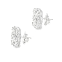 These beautiful 18k white gold diamond earrings by Christopher Desi...