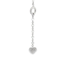 This stunning 18k white gold necklace features diamonds totaling ap...