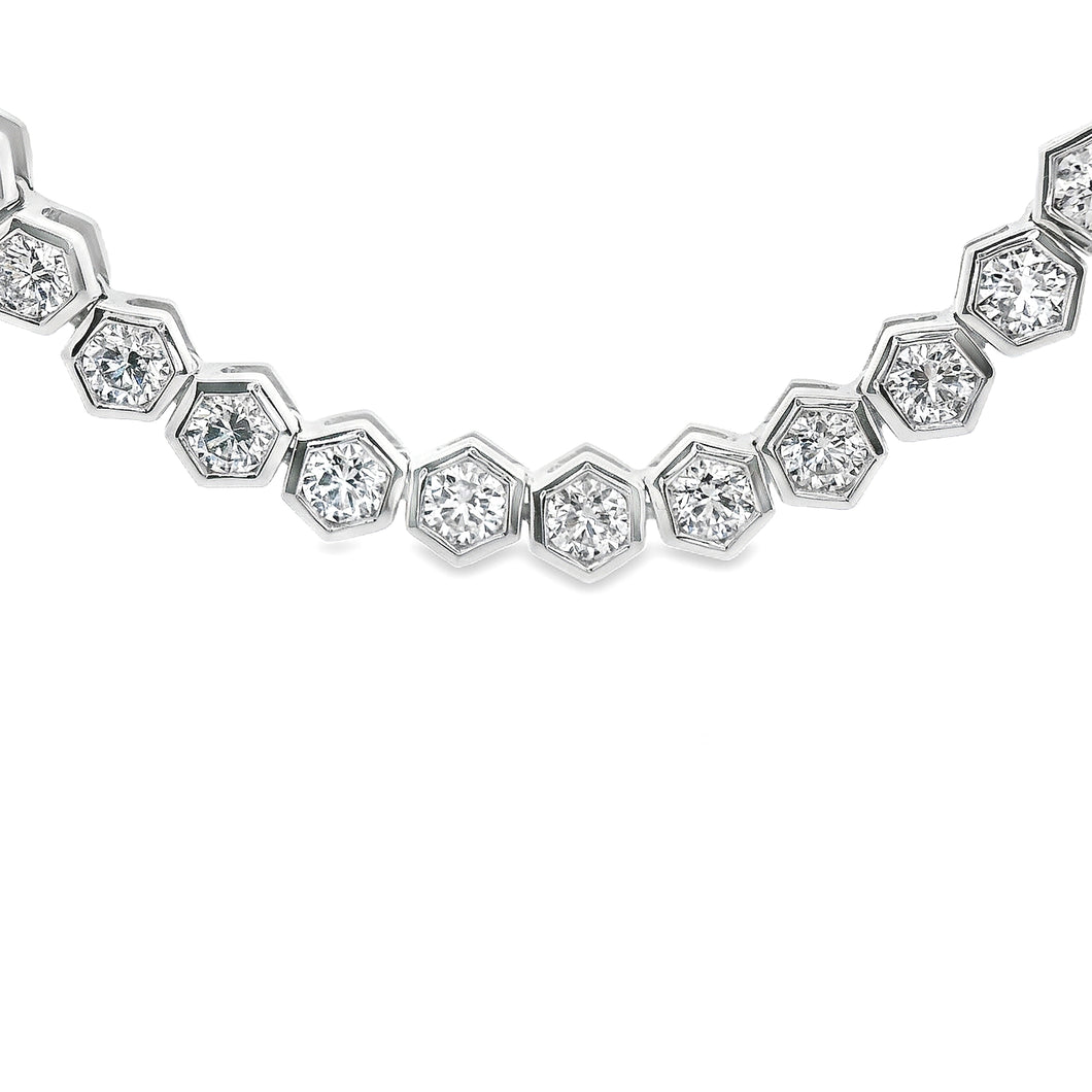 This gorgeous 18k white gold necklace features 75 round brilliant c...