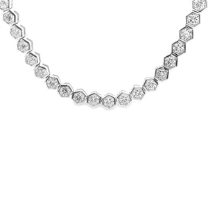 This gorgeous 18k white gold necklace features 75 round brilliant c...