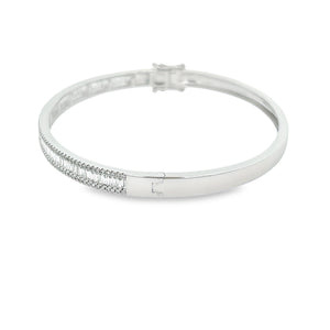 This easy to stack and style bangle features round brilliant cut an...