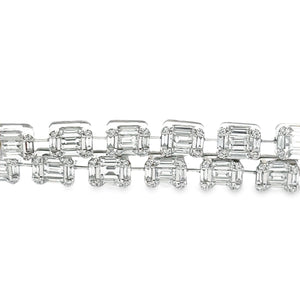 This stunning 18k white gold bracelet features a double row of roun...