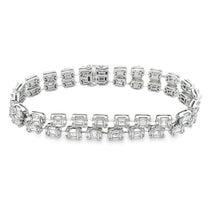 This stunning 18k white gold bracelet features a double row of roun...