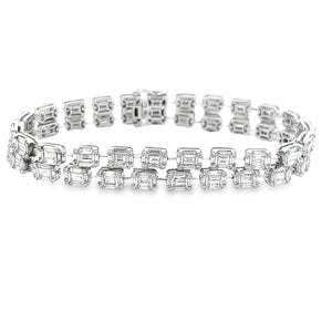 This stunning 18k white gold bracelet features a double row of roun...