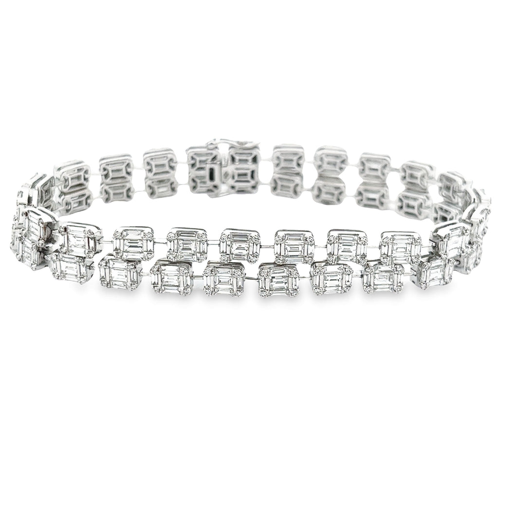 This stunning 18k white gold bracelet features a double row of roun...