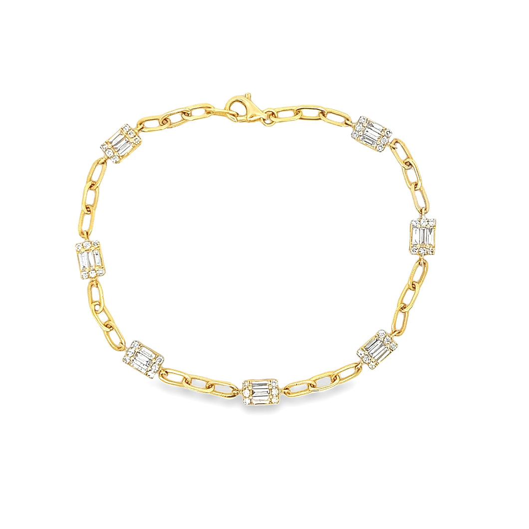 This beautiful 14k yellow gold bracelet features baguette and round...