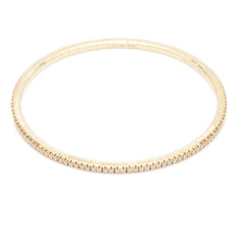 This 18k yellow gold stretch bracelet features round brilliant cut ...