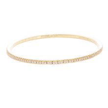 This 18k yellow gold stretch bracelet features round brilliant cut ...