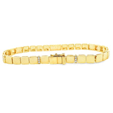 This beautiful 14k yellow gold bracelet features 51 round brilliant...