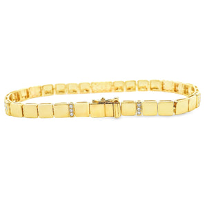 This beautiful 14k yellow gold bracelet features 51 round brilliant...