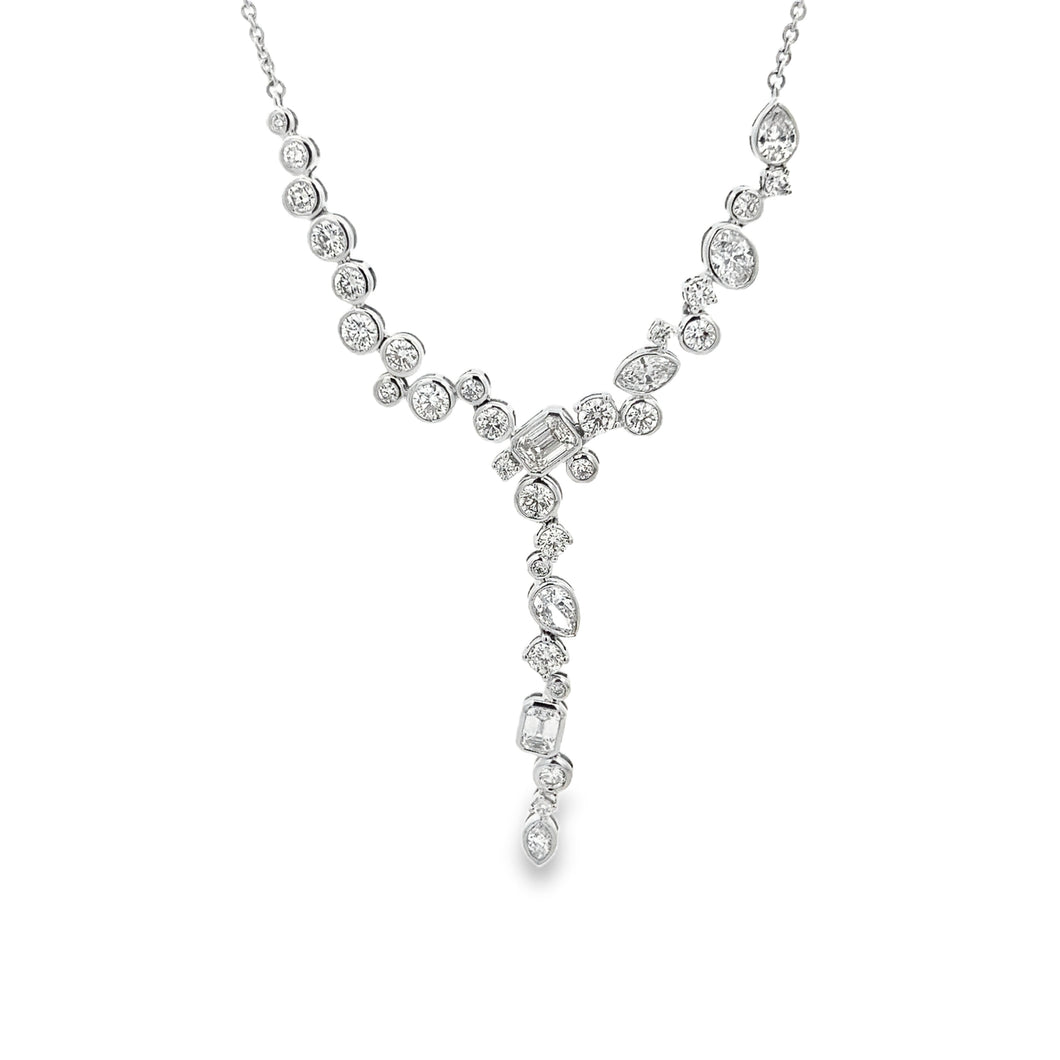 This beautiful 14k white gold diamond necklace features various sha...