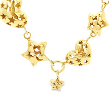 Estate piece: 14k yellow gold heart and star necklace. 3 hearts and...