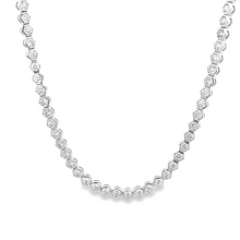 This gorgeous 18k white gold necklace features 75 round brilliant c...