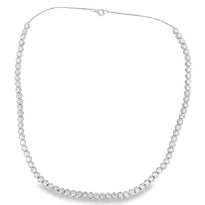 This gorgeous 18k white gold necklace features 75 round brilliant c...