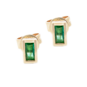 Dainty 14k yellow gold studs with 2 emeralds. 
Earrings measure 3/1...