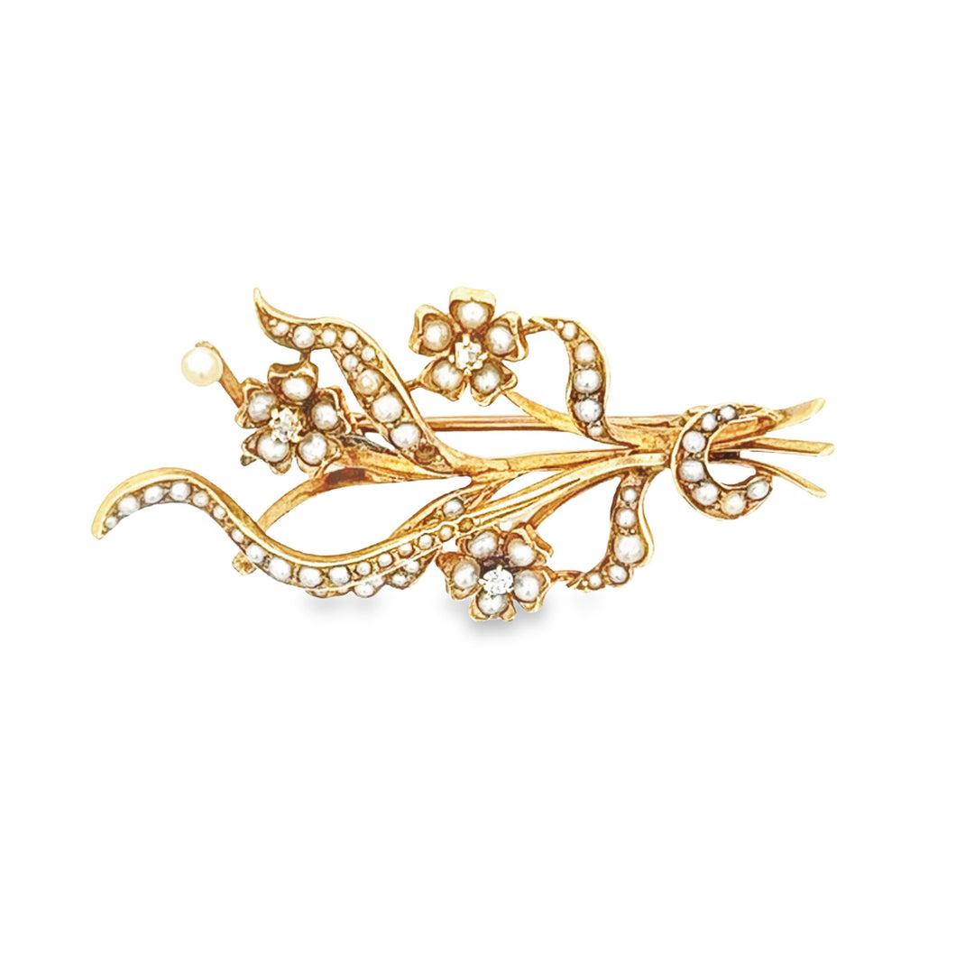 14k yellow gold flower pin with pearls.