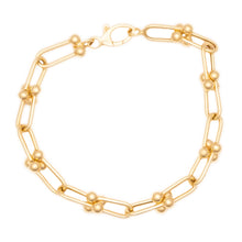 This unique 14k yellow gold bracelet features link chain, ball bear...