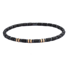 This Men's 18k rose gold matte black ceramic stretch bracelet from ...