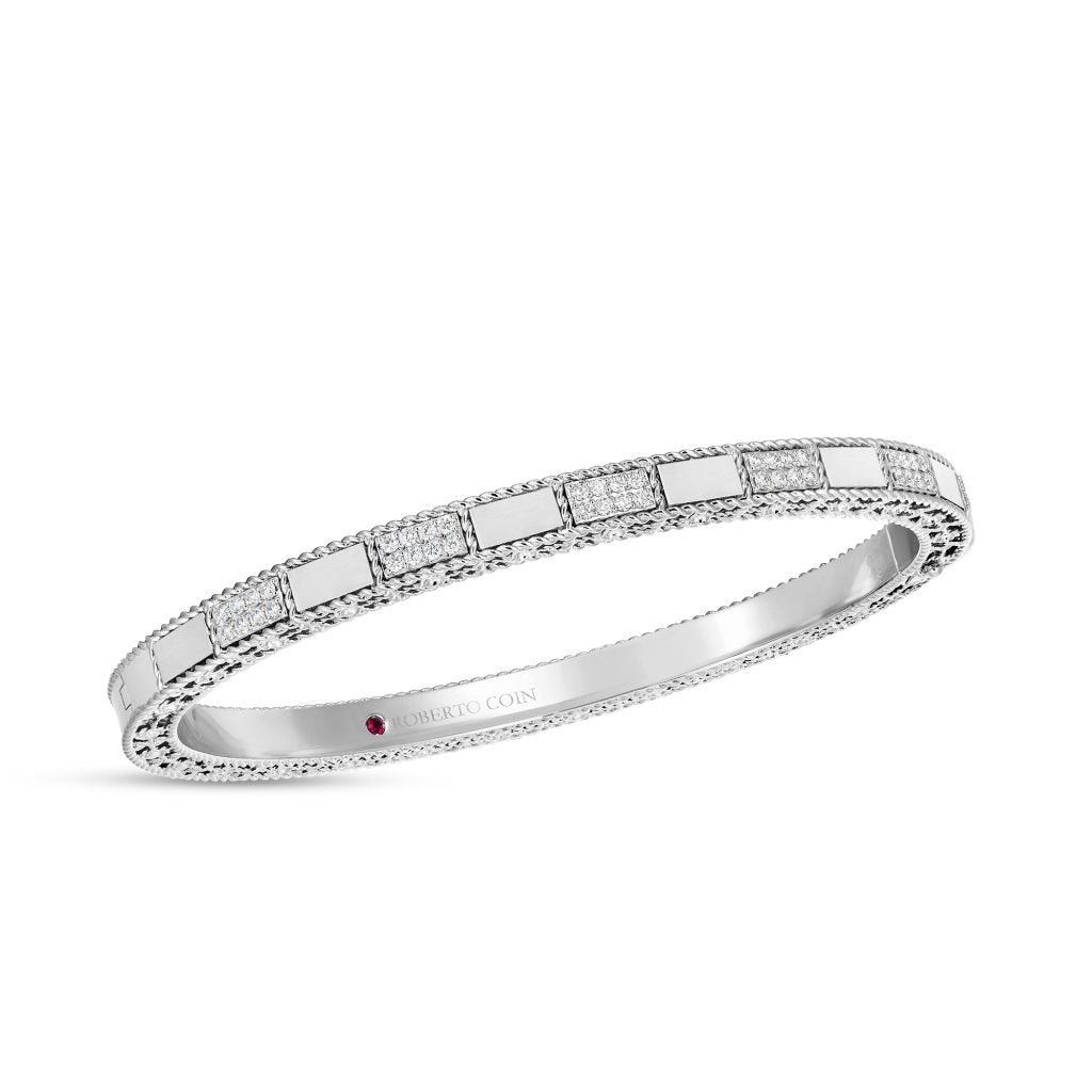 18k white gold mosaic alternating diamond bangle from Roberto Coin....