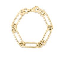 This 18k yellow gold bracelet showcases a mixture of oval and circl...