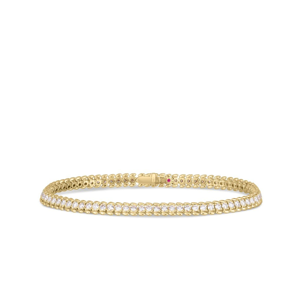 18k yellow gold classic diamond ribbed tennis bracelet from Roberto...