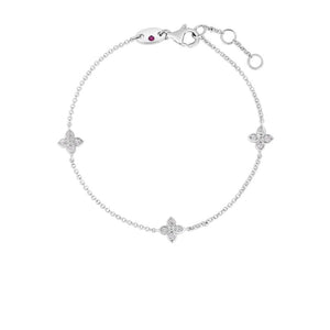 18k white gold Love by the inch 3 station flower bracelet from Robe...