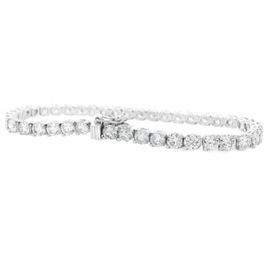 This beautiful platinum bracelet features 43 round brilliant cut di...