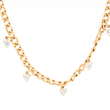 This modern necklace features 9 round brilliant cut diamonds totali...