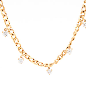 This modern necklace features 9 round brilliant cut diamonds totali...