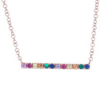 Easy to layer rose gold necklace featuring rainbow gemstones on a s...