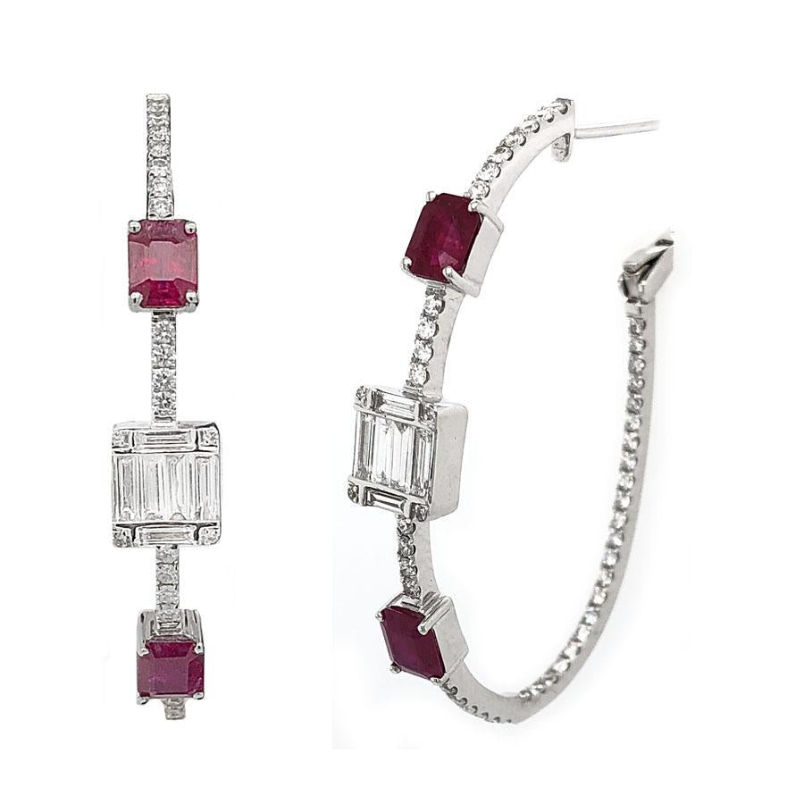 These earrings feature baguette and round brilliant cut diamonds th...