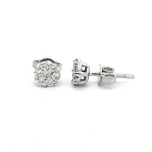 These beautiful 14k white gold stud earrings feature round brillian...