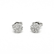 These beautiful 14k white gold stud earrings feature round brillian...