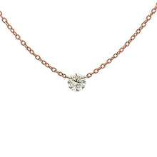 A modern and minimalist rose gold necklace with a diamond totaling ...