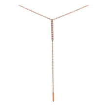 This lariat necklace features 11 round brilliant cut diamonds total...