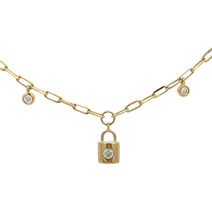 This 14k yellow gold paperclip necklace features 4 bezel-set round ...