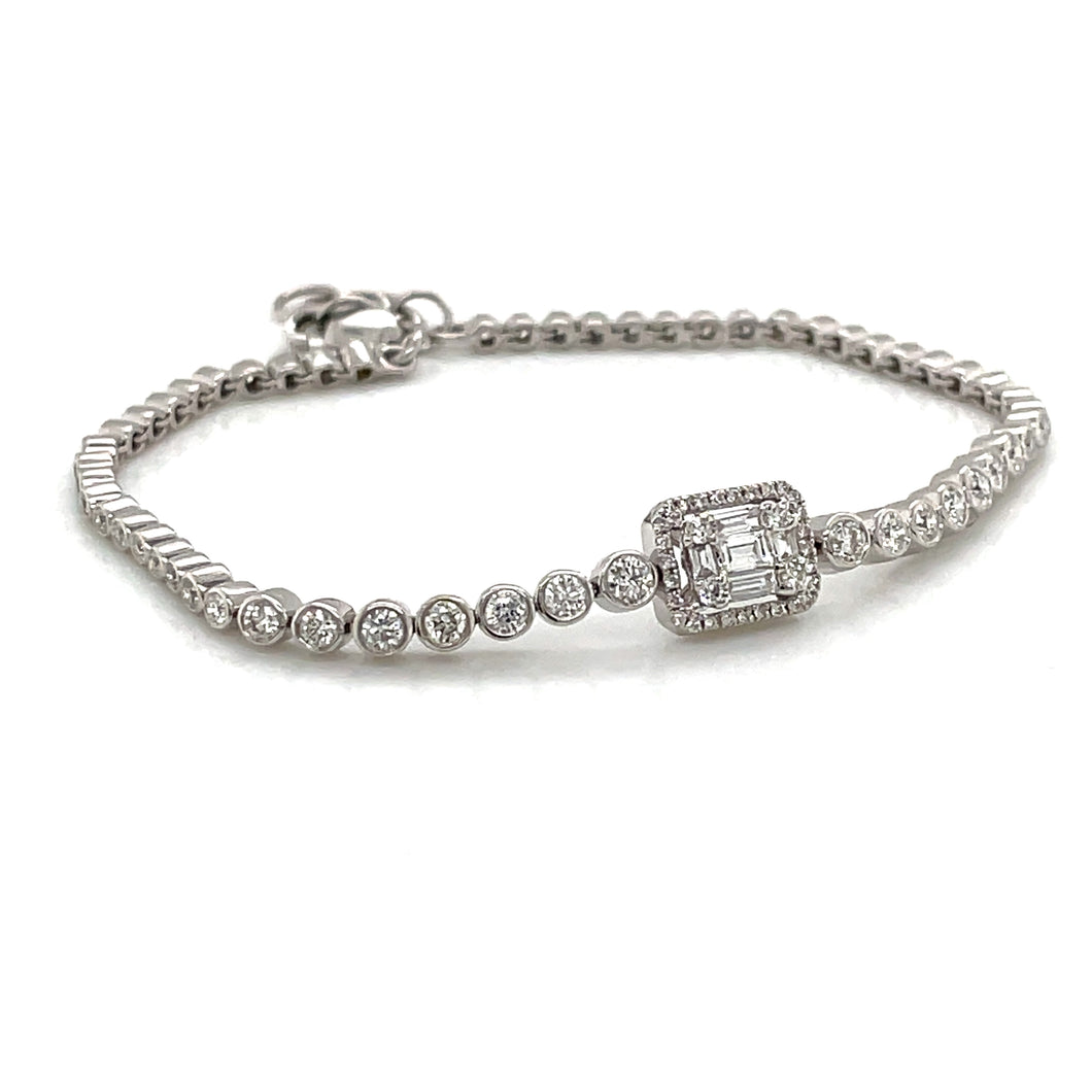 This 14kt white gold bracelet features 0.5ctw baguette diamonds at ...